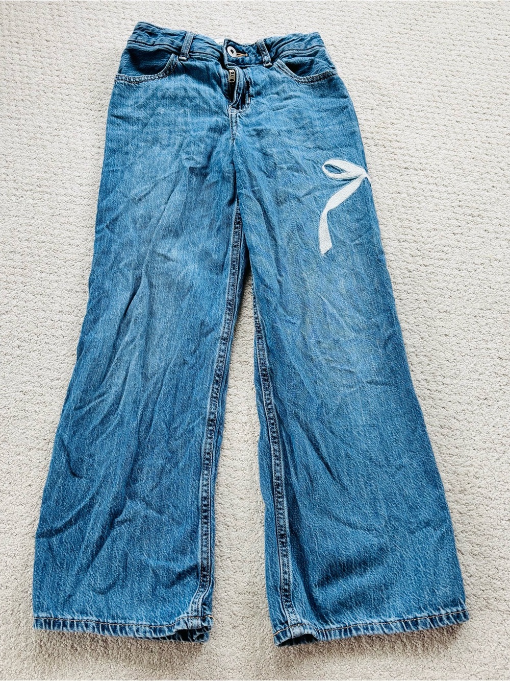 abercrombie kids blue wide-leg jeans with white bow